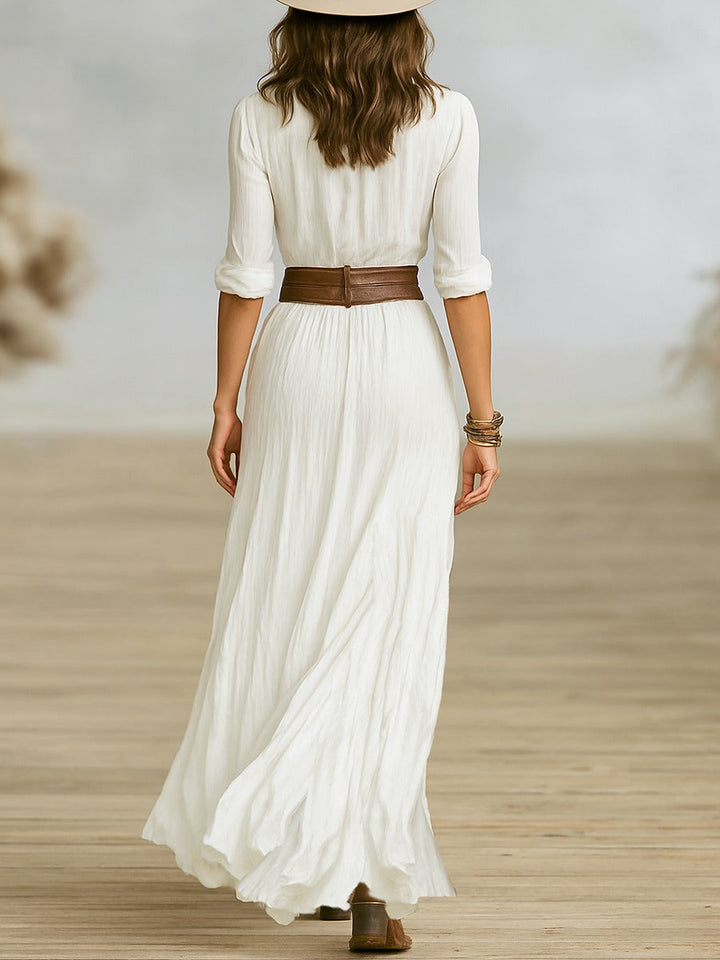 Long belted dress with pleated lapels in cotton and linen